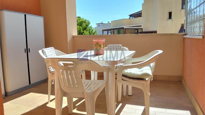 Appartamento con terrazzi, garage e ascensore